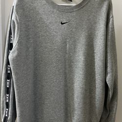 NIKE WOMANS FLEECE (large)