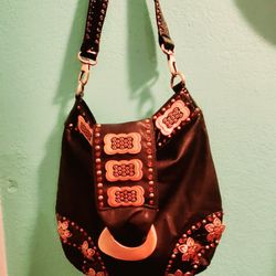 Blue ESSENCE BLACK AND BRASS PURSE..HOBO STYLE...LIKE NEW