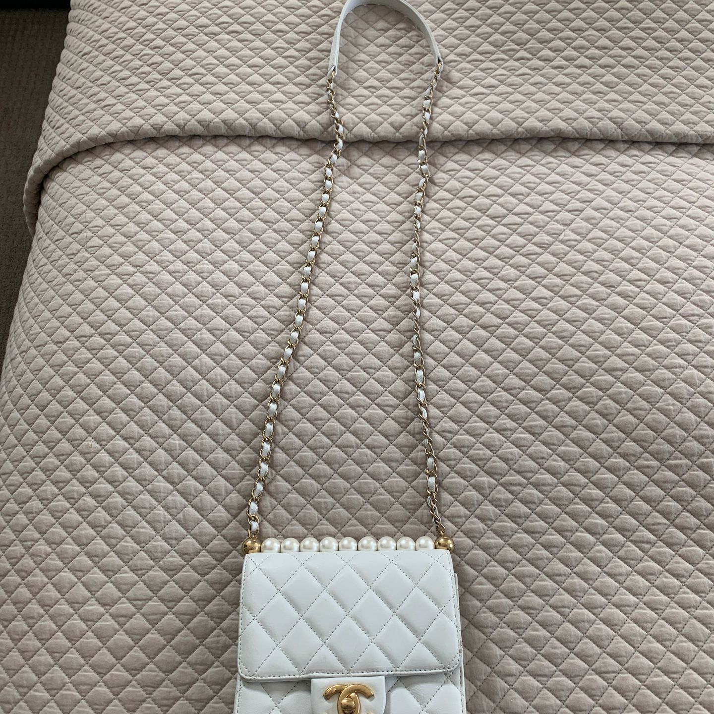 Chanel pearl flap bag