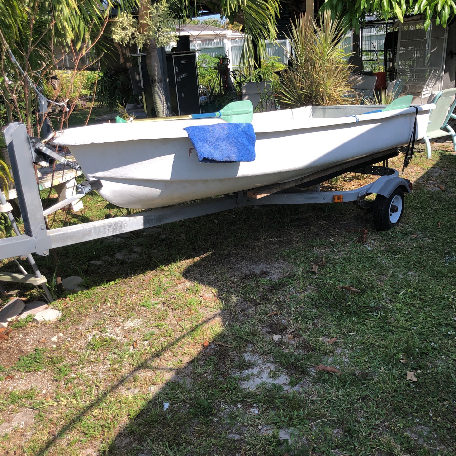 Photo 11 foot dinghy new tires on the chassis small cooler builtin new tires $500