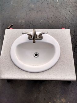 White Ceramic Oval Sink With Countertop