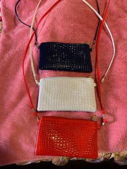 3 carteras de vestir