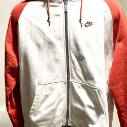 Nike Sportswear Club Fleece Full-Zip Hoodie in a red and white colorway. This classic and comfortable hoodie features a full-zip closure, an adjustabl