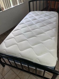 Twin bed with matress