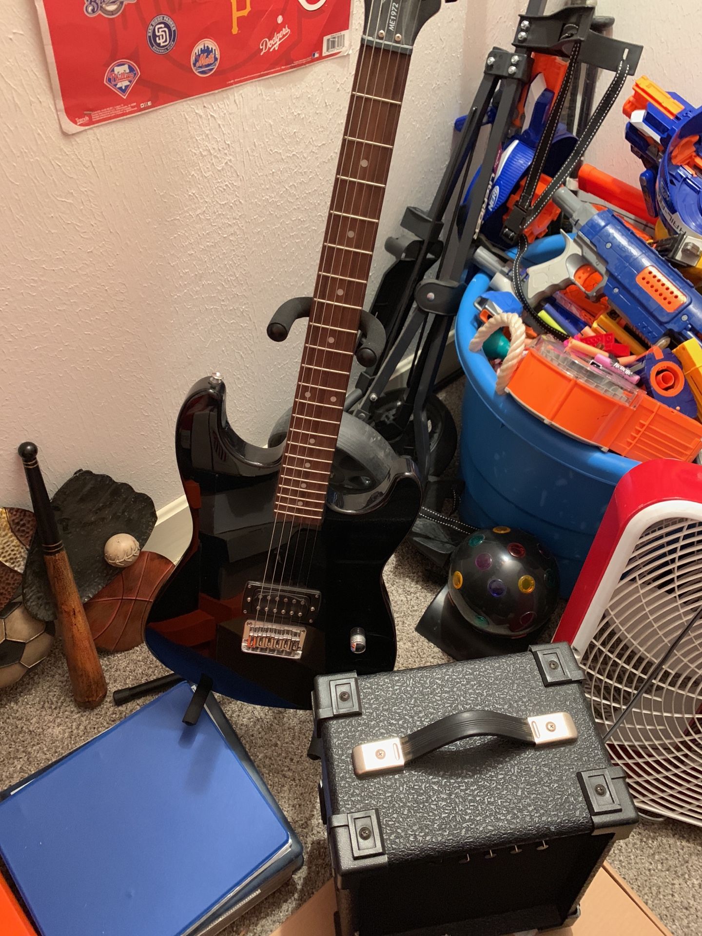 Electric guitar, stand, and speaker 65 obo
