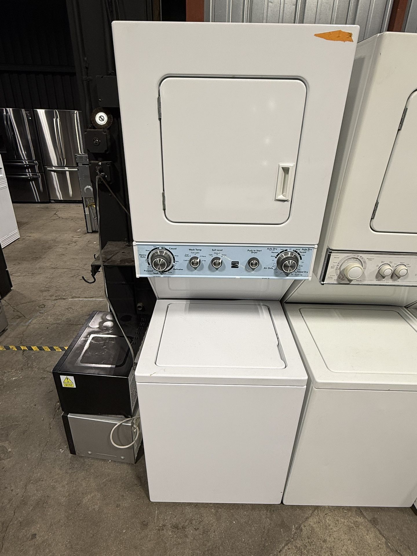 Kenmore electric 220 volts stackable washer and dryer 24 inches