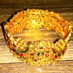 Ornate Gold Bracelet with Gemstones