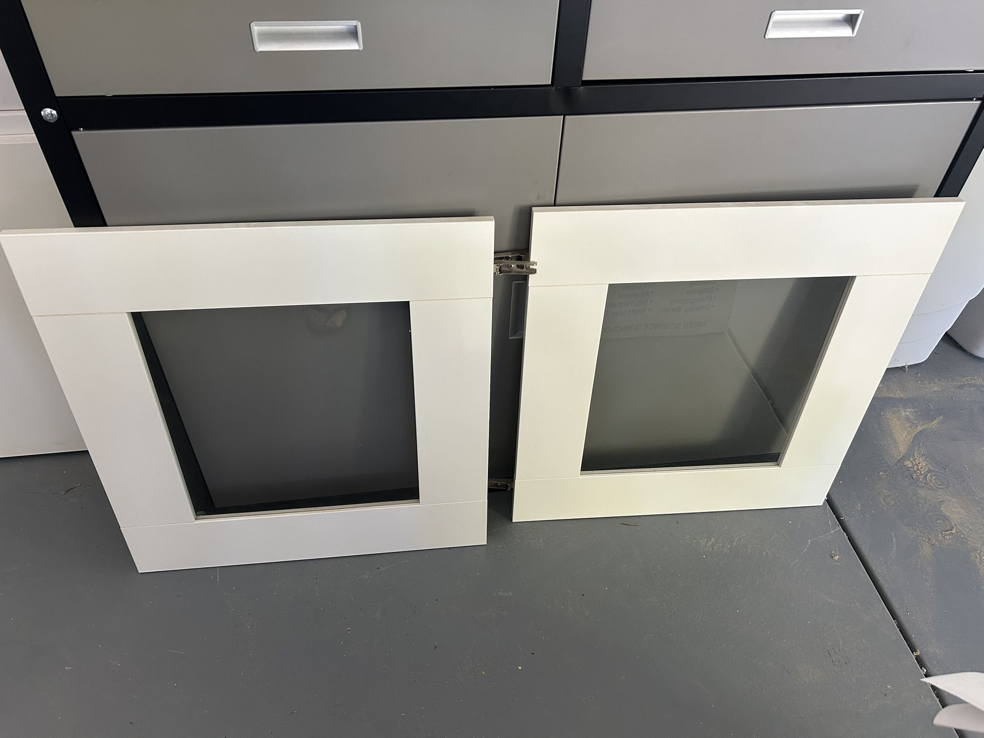 Modern White Cabinet With Clear Glass Door