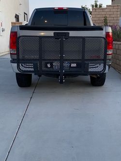 Trailer hitch cargo carrier