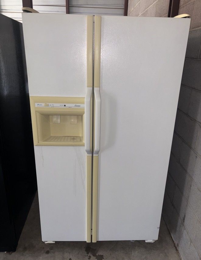 White GE Refrigerator And Freezer