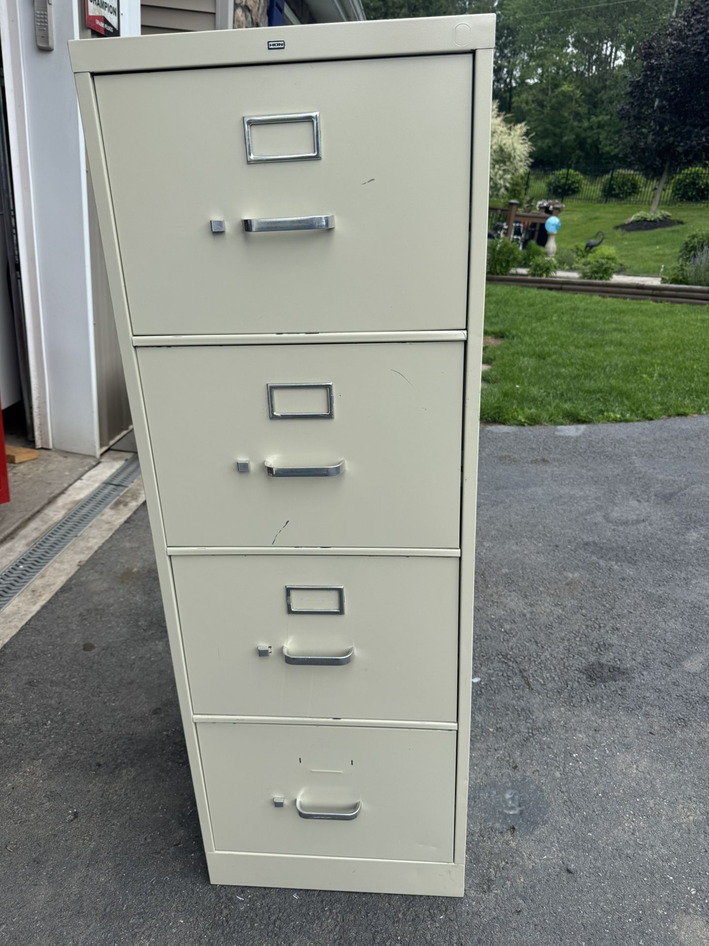 HDN Four Drawer Filing Cabinet. 52”H x 18” W X 26 1/2” D. Must Pick Up