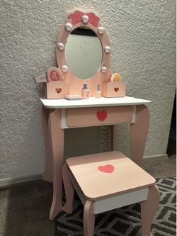 Little girl play vanity