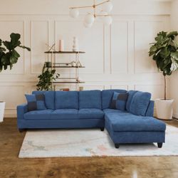 Blue Sectional Couch And Ottoman