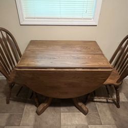 Solid Oak Table With Two Matching Chairs