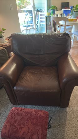 Very well loved chair… been in the family for years… worn but no rips or tears… very comfy..