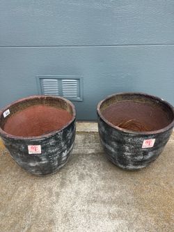 Pair of large decorative clay pots