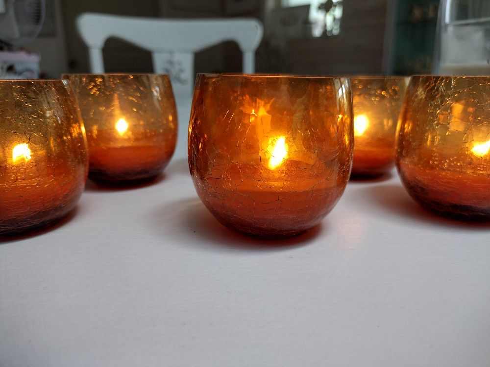 Amber colored crackled glass candle holders