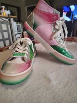 These are Groundup, WICKED movie high tops in women's size 7 1/2
