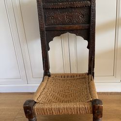 Antique carved Moroccan low seat