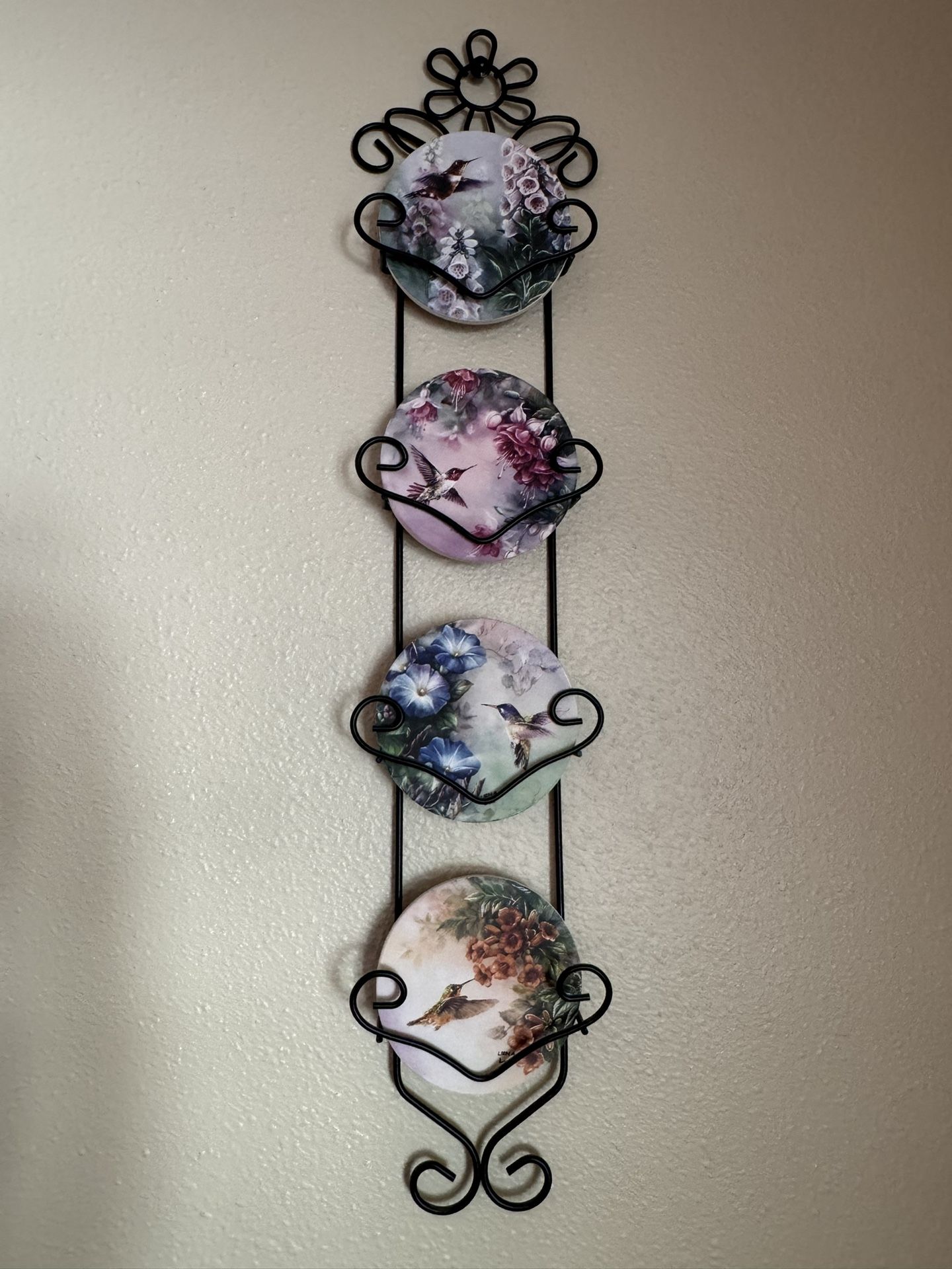 Humminbird retreat by Thomas Kinkade 