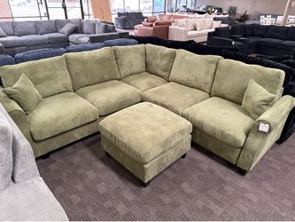 L shaped green sectional w/ ottoman