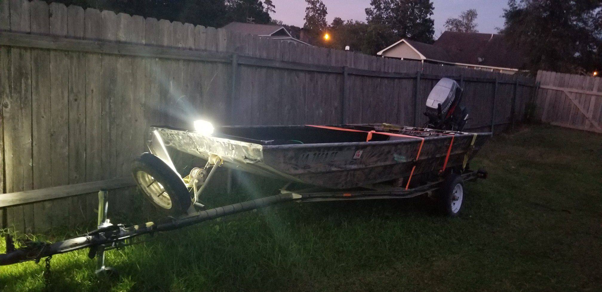14' boat brand new trailer lights2 new trailier tires 40 horse tahatsu 2 stroke DLTI fuel injected runs good and powerful