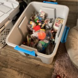 Lots of McDonald’s happy meal toys, most of them still in plastic