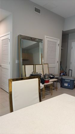 Espejo y 4 sillas