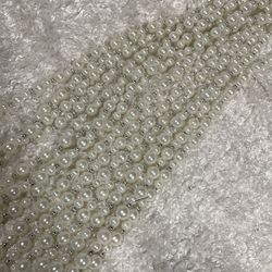 Beaded garland, white, and silver