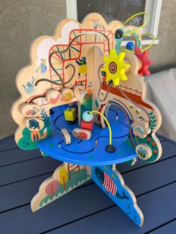 Manhattan Toy Playground Adventure Wooden Toddler Activity Center with Gliders, Abacus Track, Spinners, Spring Toys and Bead Runs