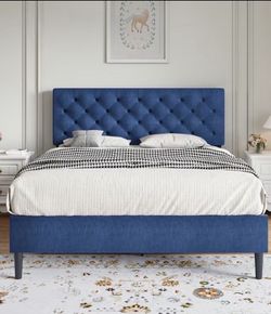 Blue upholstered queen bed