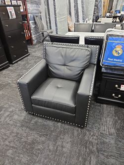 Brand new black faux leather chair special