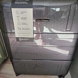 Smooth-Roll Travel Gear - Convenient Luggage Carriers politics just