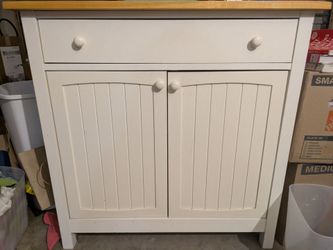 Farmhouse style kitchen storage cabinet