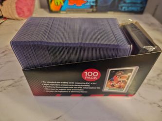 100 top loaders never used and sleeves.