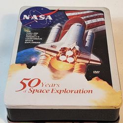 Nasa 50 years of Space Exploration 5 Disc DVD with Decorative Tin. Great condition complete with booklet and collectors metal tin box disc case. 