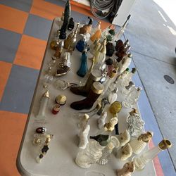 63 collectable Avon bottles