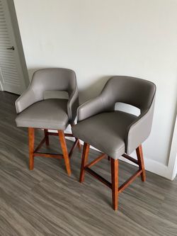 Set of 2 Modern Swivel Counter Stools from Ashley Furniture