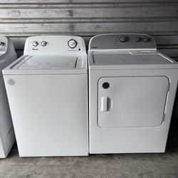 White Amana Washer And Whirlpool Electric Dryer