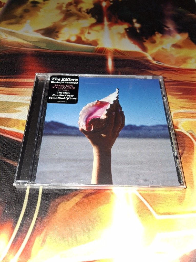 THE KILLERS WONDERFUL WONDERFUL MUSIC CD...NEW & SEALED...BACK CASE IS CRACKED...ADULT OWNED AND KEPT IN A SMOKE FREE HOME...$8 FIRM...