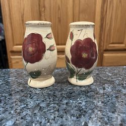 Vintage Large floral pair of salt and pepper shakers. Size approximately 5 inches tall. Preowned excellent condition with stoppers.