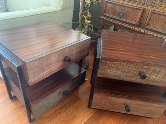 A pair of modern rustic wooden nightstands with drawers and open shelves.