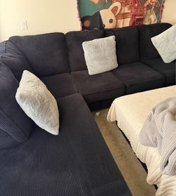 Black corduroy couch with chaise