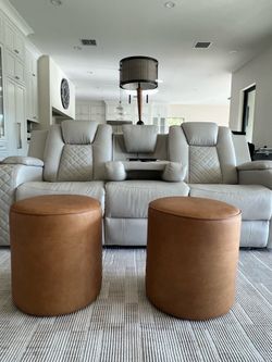 Authentic West Elm Isla Leather Ottomans — pair available.