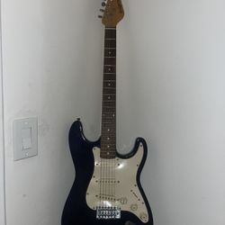 Broken Blue Electric Guitar 