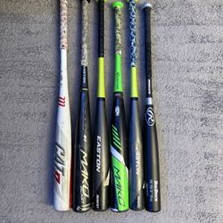 Assorted mixed baseball bats. All bats still have life left in them