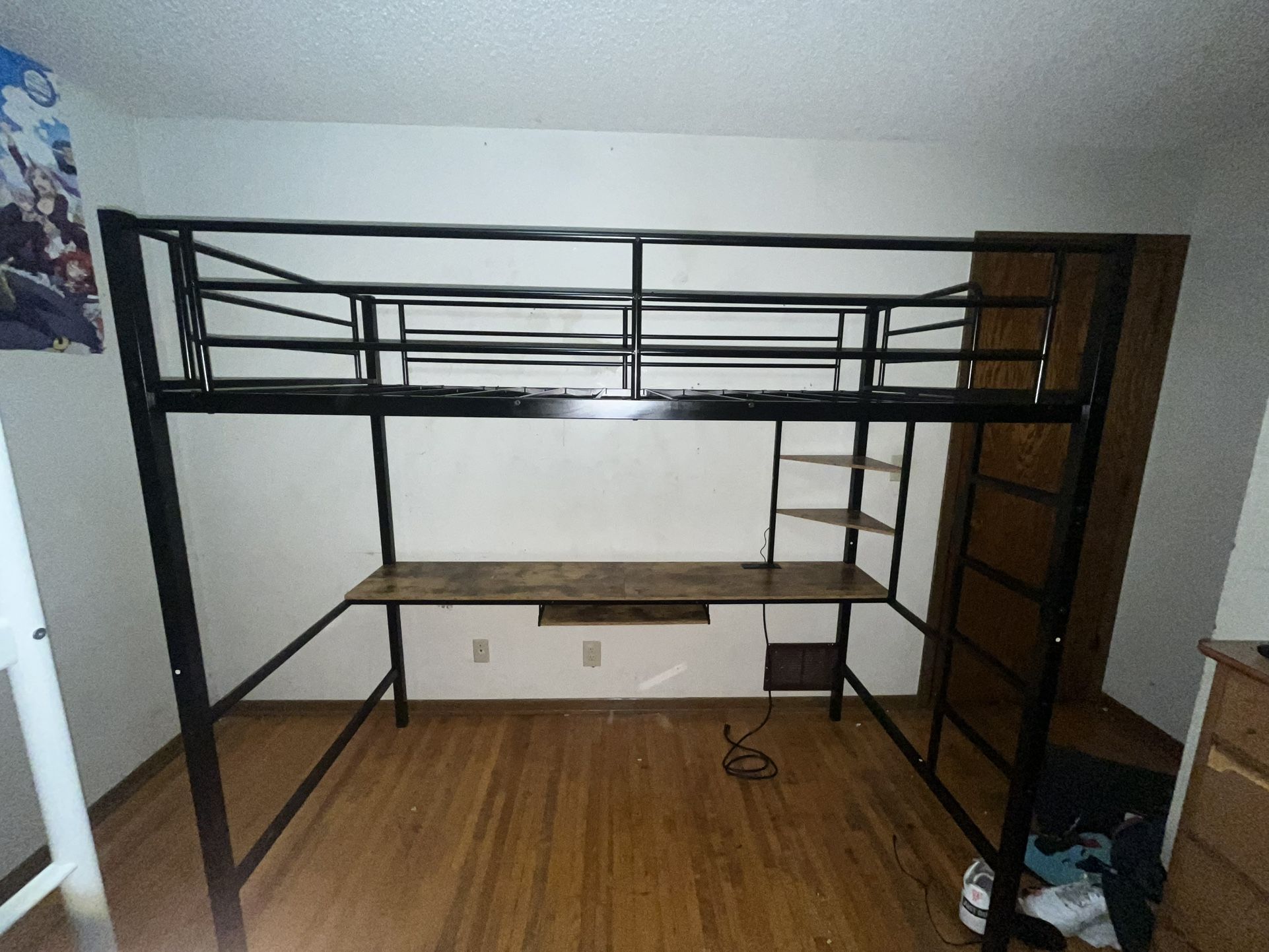 Twin sized bed frame with a desk