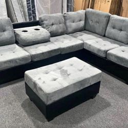 Grey Reversible Sectional With Cup Holder And Storage Ottoman. Brand New.
