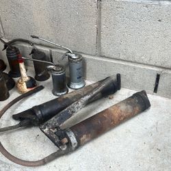 Vintage Oil, Squeeze Cans, And Grease Guns For Sale As A Set 