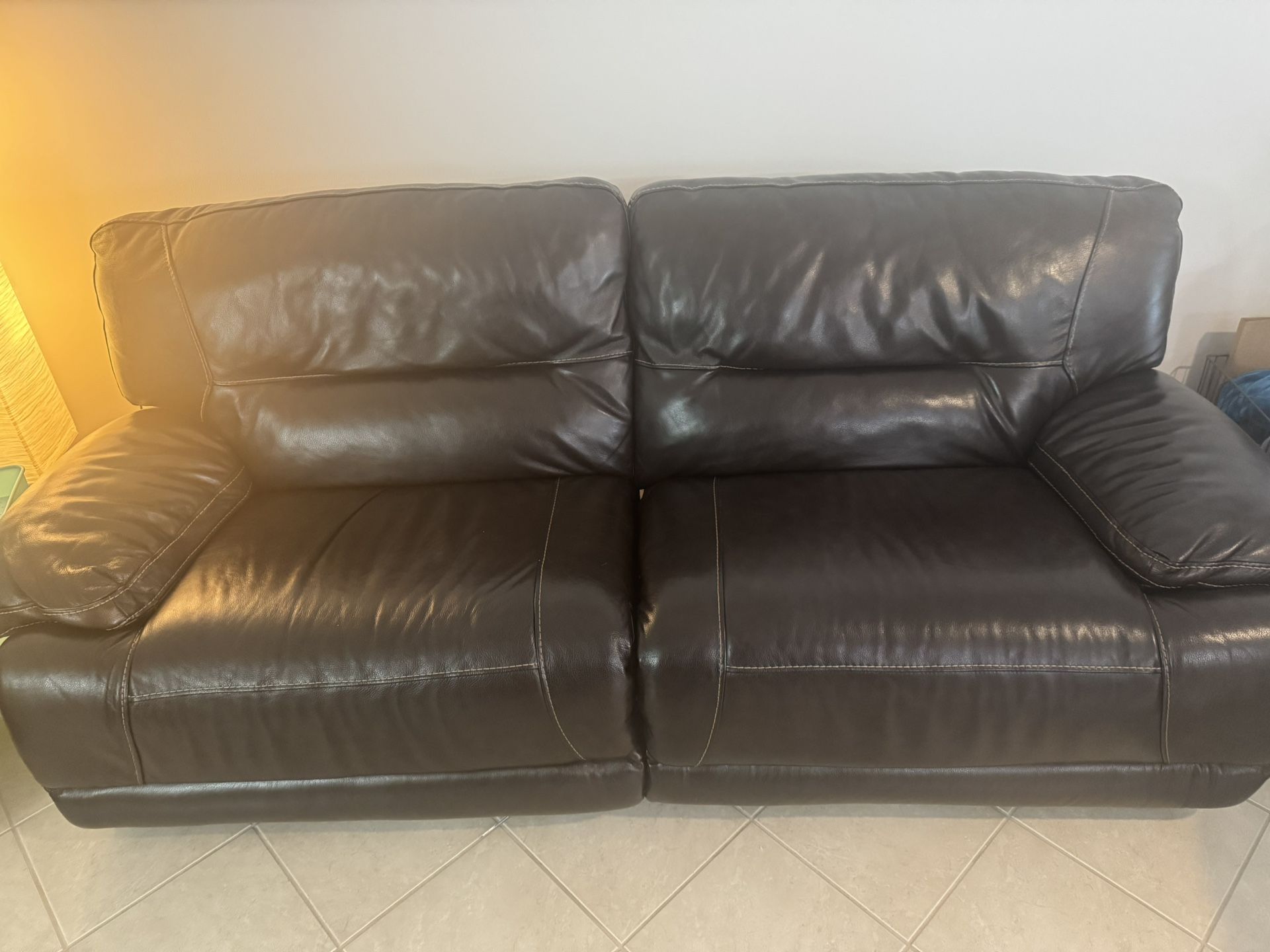 RECLINING LEATHER COUCH AND LOVE SEAT